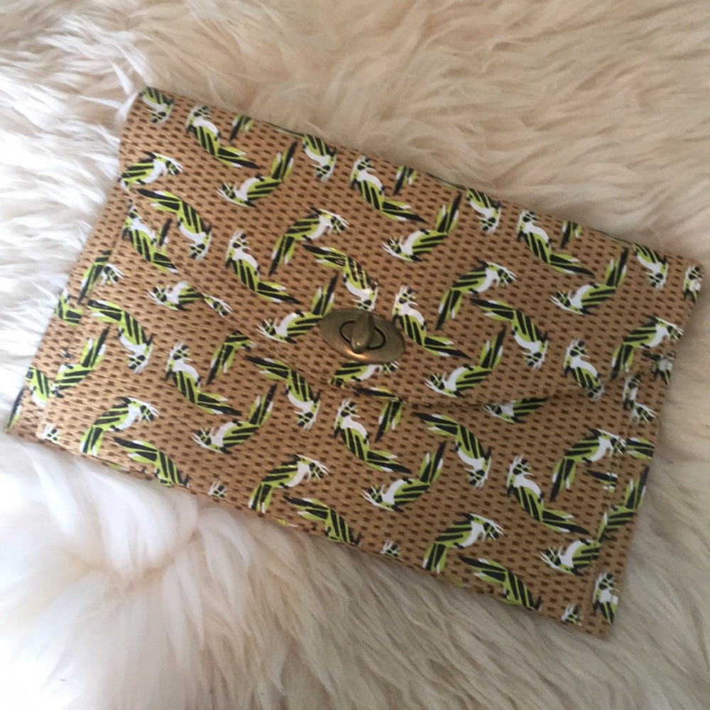 Anthropologie straw parrot clutch